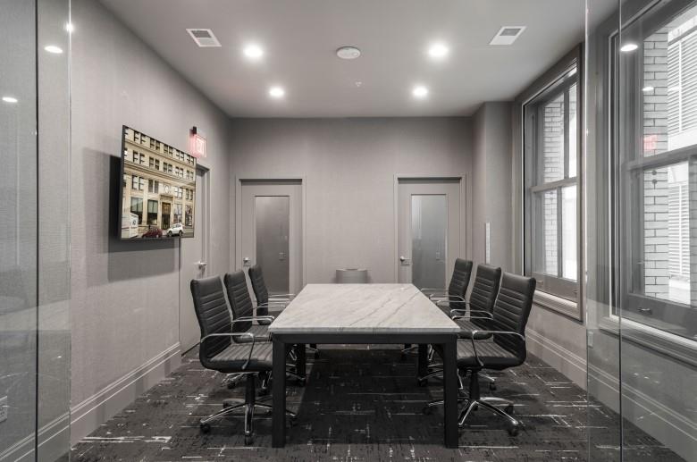 429 Forbes Avenue, Unit 1907 Pittsburgh, PA 15219 - Photo 14 of 16 a view of a dining room with furniture and window
