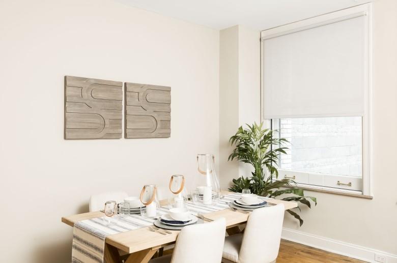 429 Forbes Avenue, Unit 1907 Pittsburgh, PA 15219 - Photo 5 of 16 a dining room with furniture and wooden floor