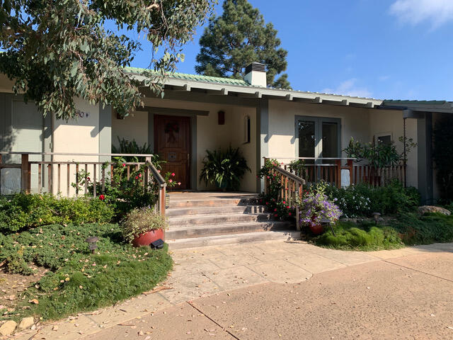 a front view of a house with porch