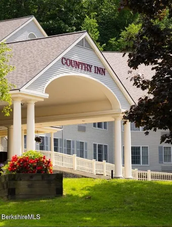 a view of a house with a swimming pool