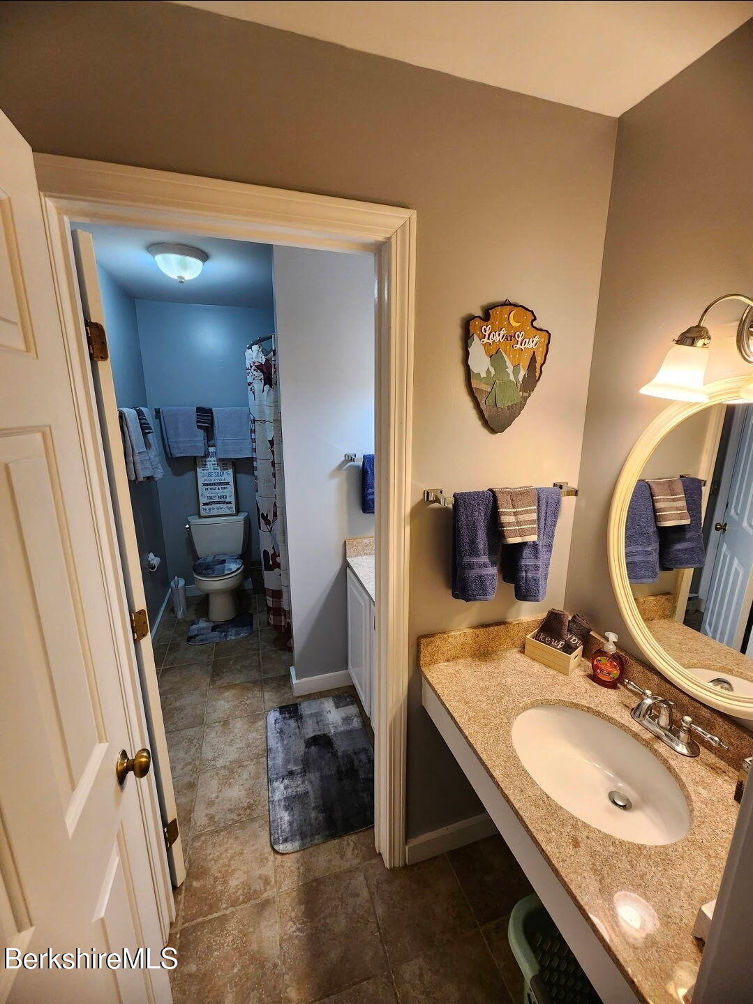 37 Corey Road, Unit 521 Hancock, MA 01237 - Photo 9 of 14 a bathroom with a sink and a mirror