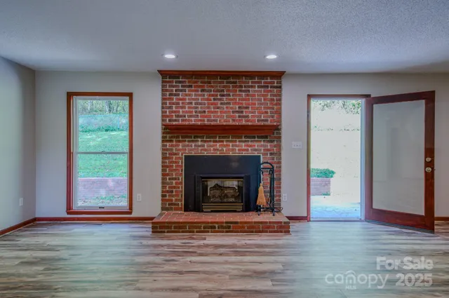a kitchen with stainless steel appliances a sink and a refrigerator