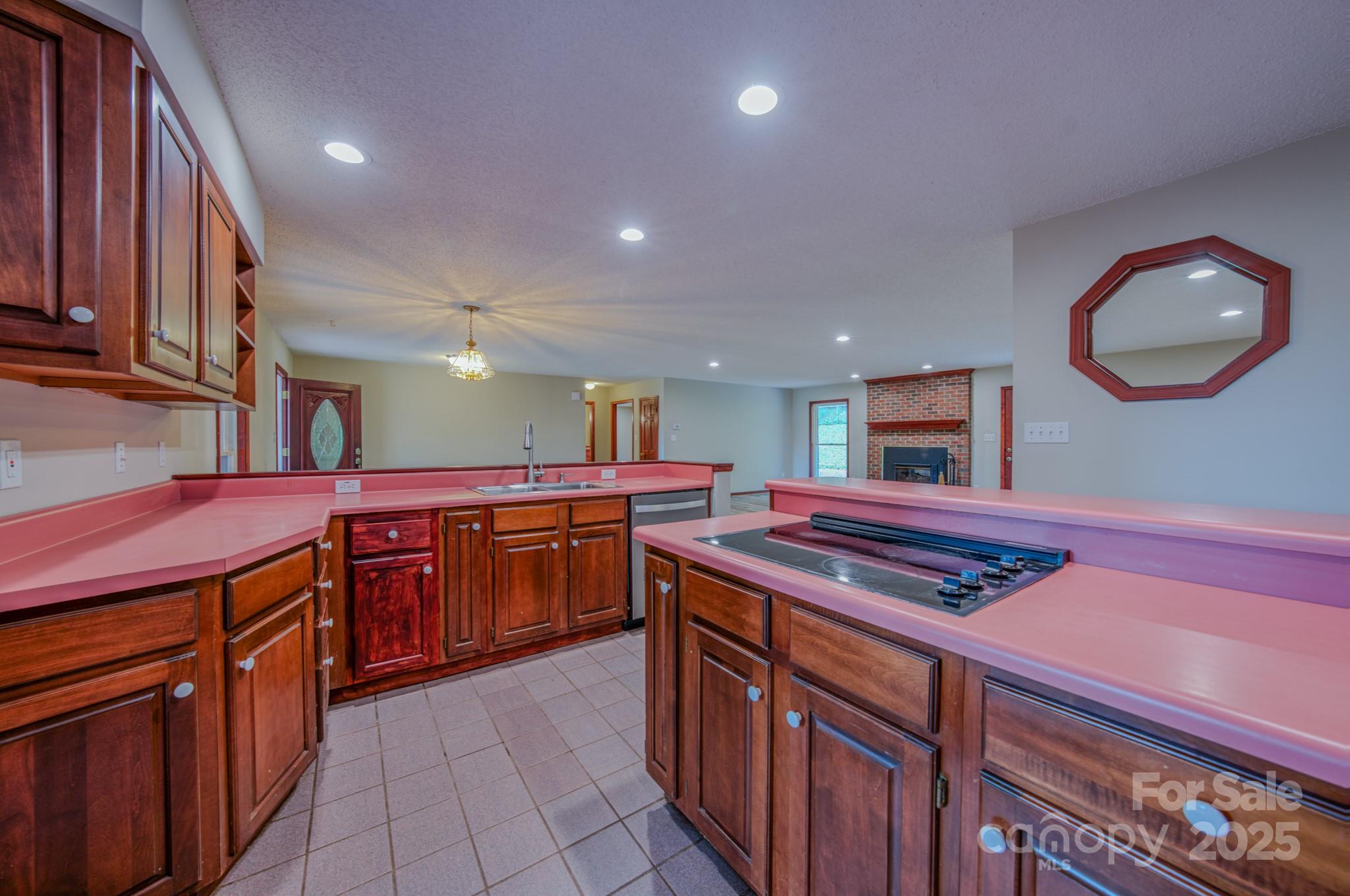 35 Byrd Road Candler, NC 28715 - Photo 20 of 46 a kitchen with a stove a sink and a refrigerator