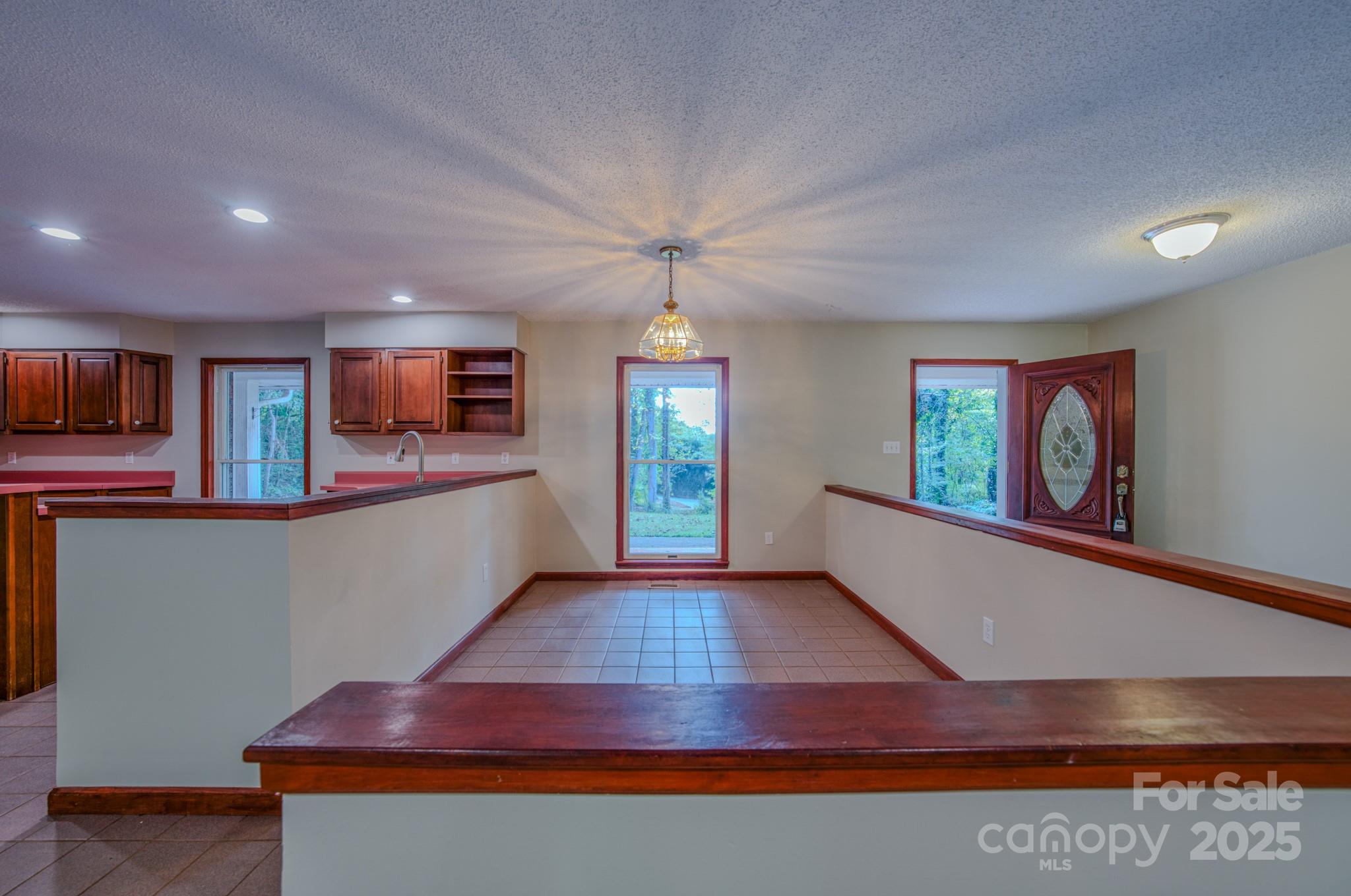 35 Byrd Road Candler, NC 28715 - Photo 25 of 46 a living room with furniture and a wooden floor