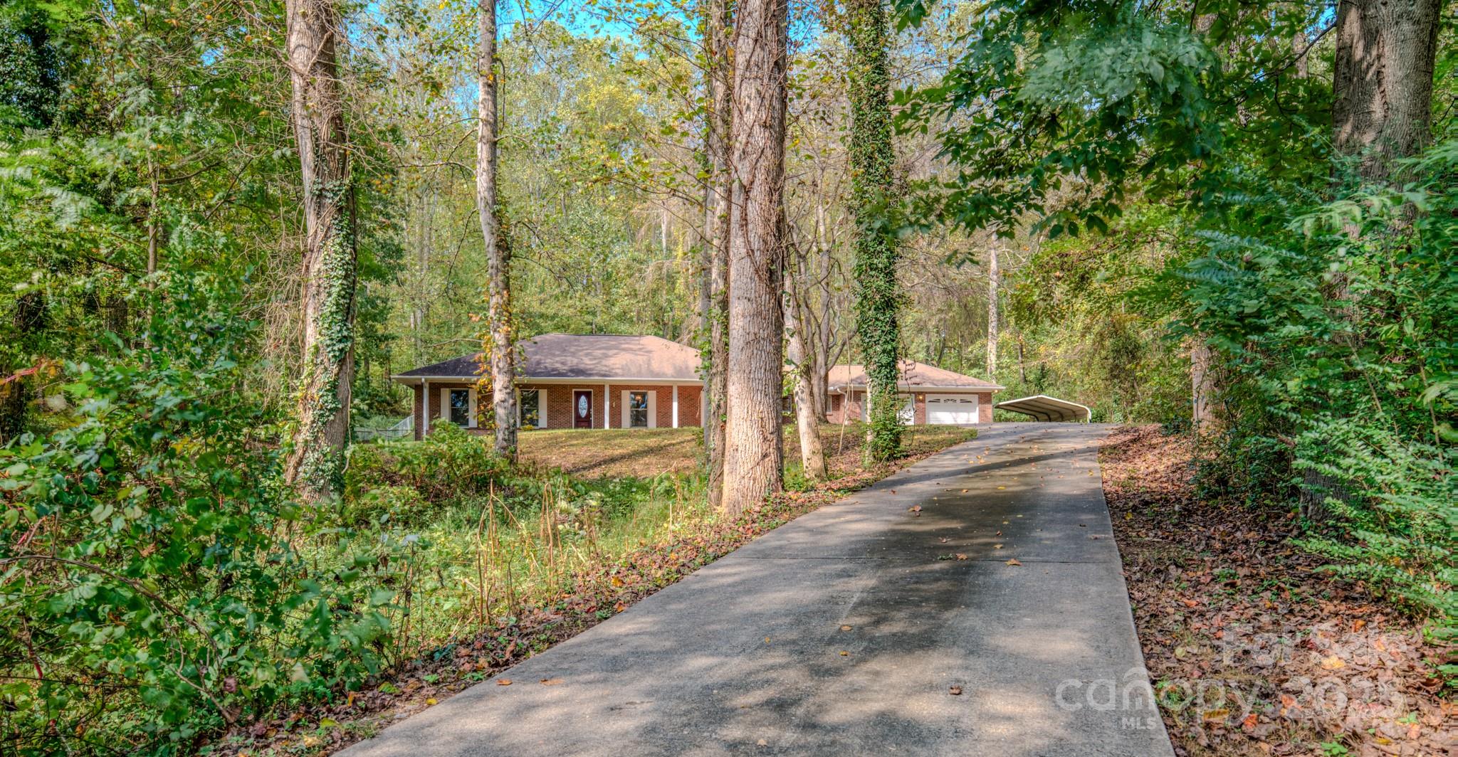 35 Byrd Road Candler, NC 28715 - Photo 46 of 46 a view of a house with a yard