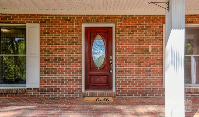 a front view of a house with a door