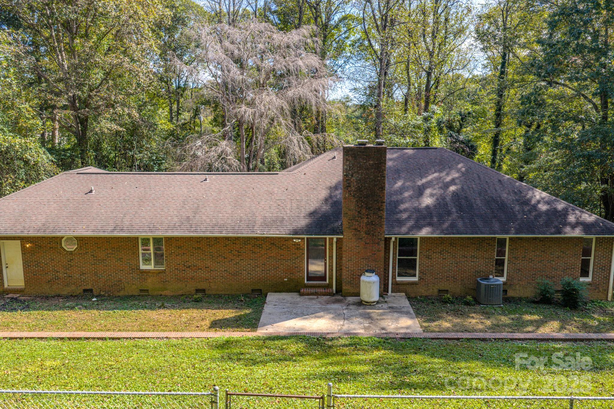 35 Byrd Road Candler, NC 28715 - Photo 9 of 46 a front view of a house with garden