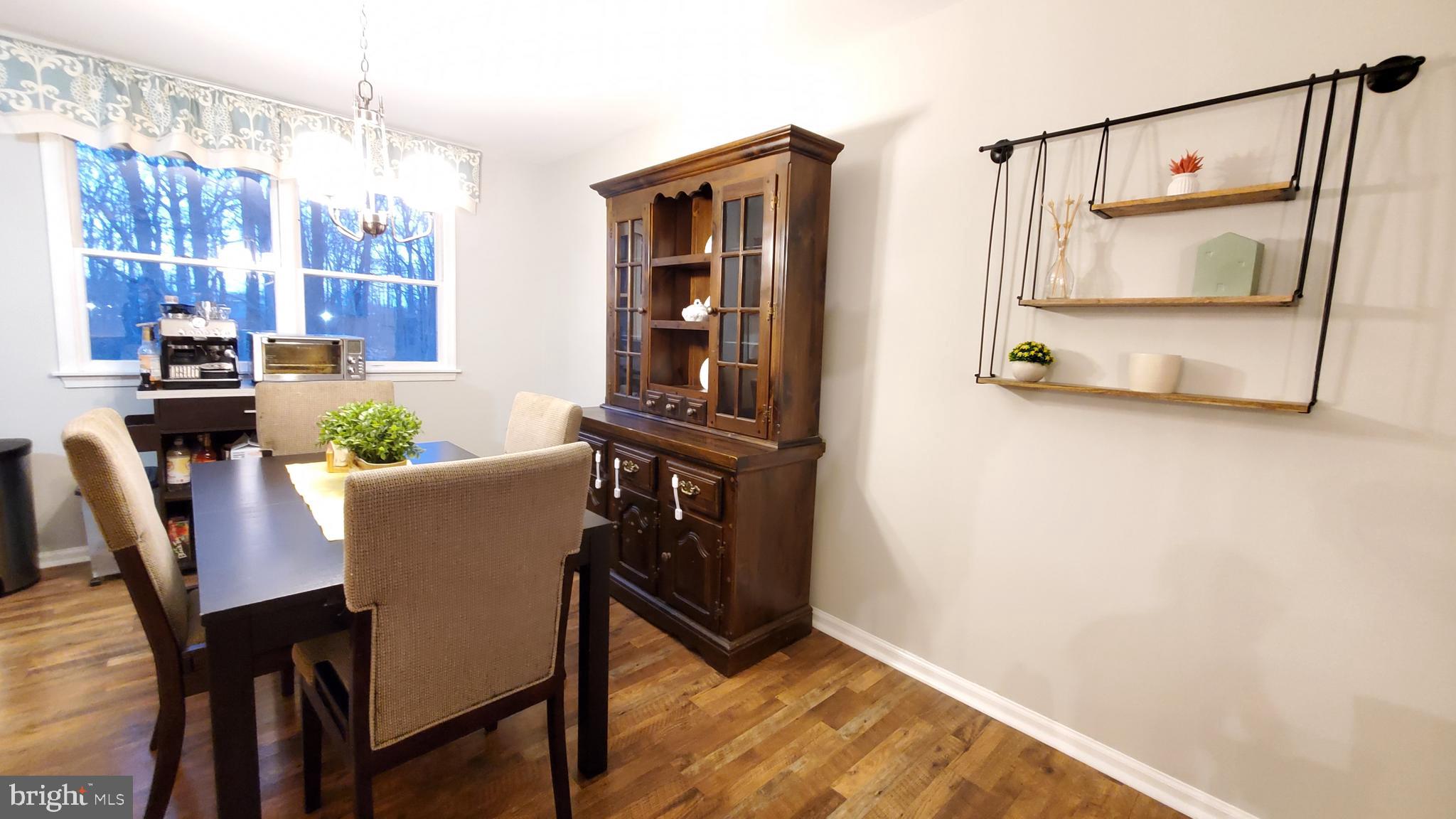 135 North Hunter Forge Road Newark, DE 19713 - Photo 5 of 20 Dining room with good looking laminate floors