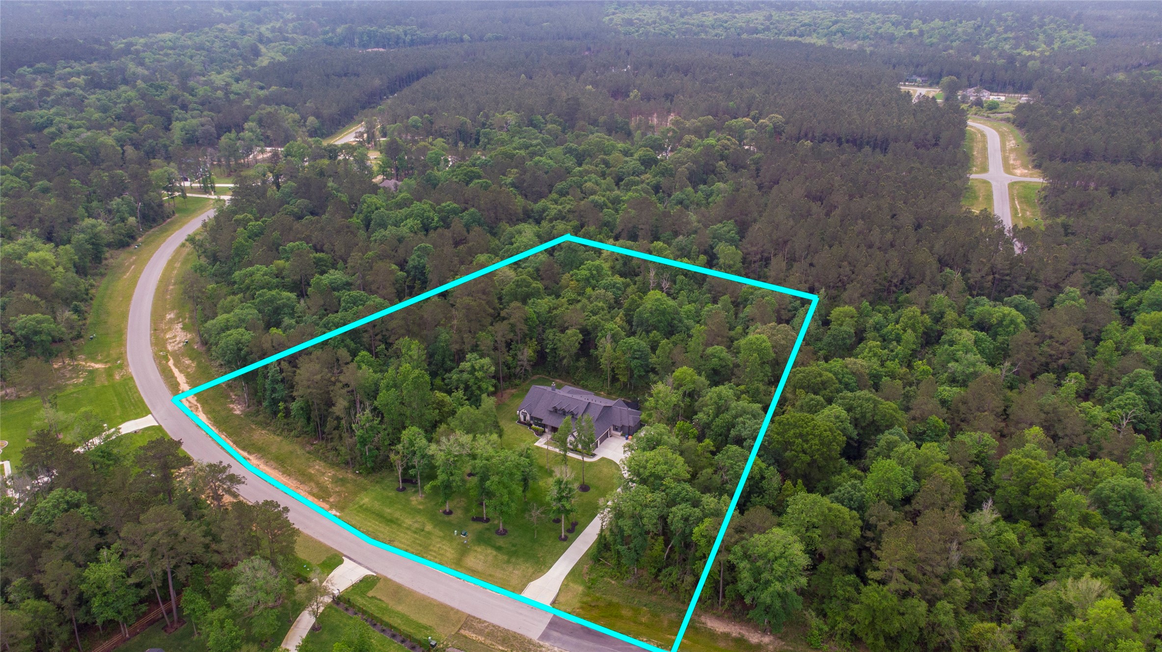 12915 Oak Barrel Road Willis, TX 77378 - Photo 44 of 46 This home is situated in the middle of 4 acres and surrounded by nature.