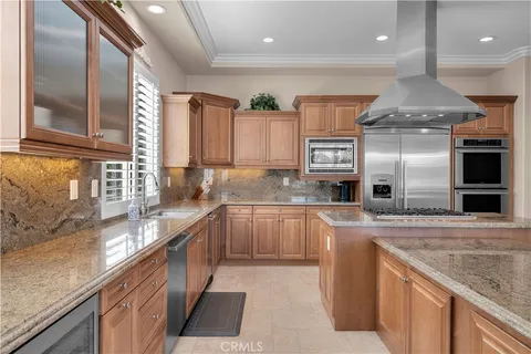 a living room with furniture fireplace and flat screen tv