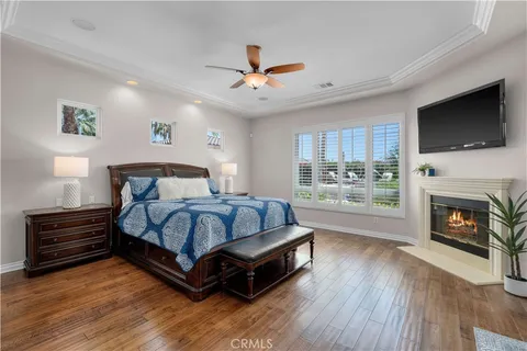 a large bathroom with a large mirror vanity and sink