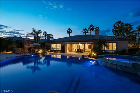 a living room with furniture or outdoor view and a large window