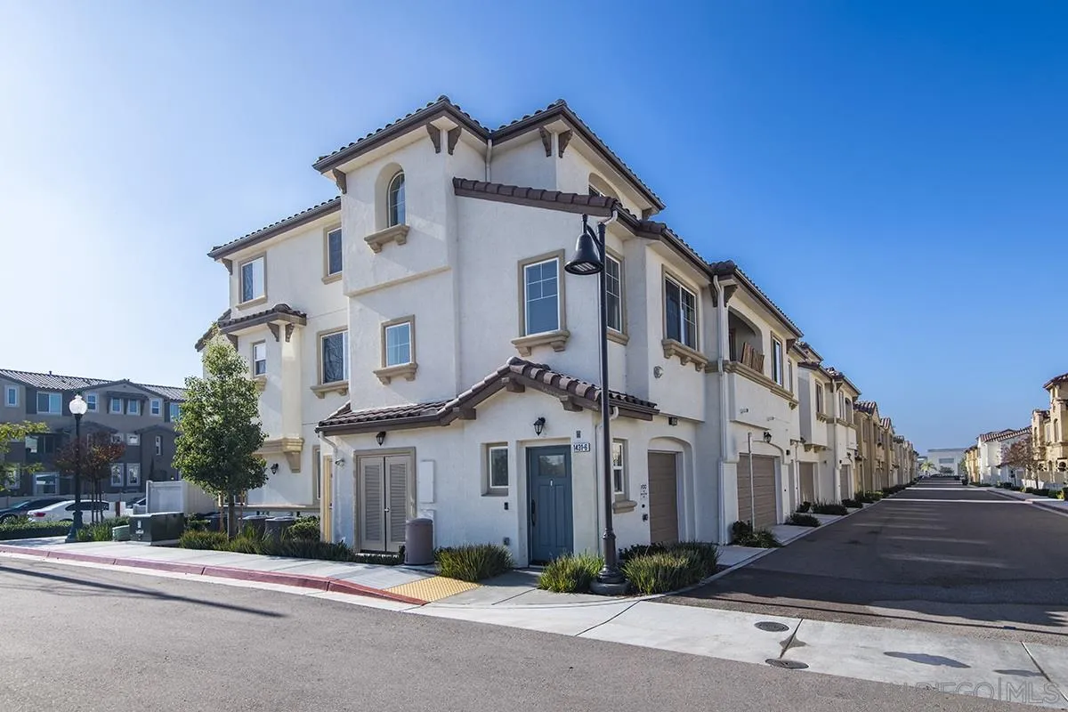 1431 Santa Victoria Road, Unit 5 Chula Vista, CA 91913 - Photo 3 of 26 a front view of a white building