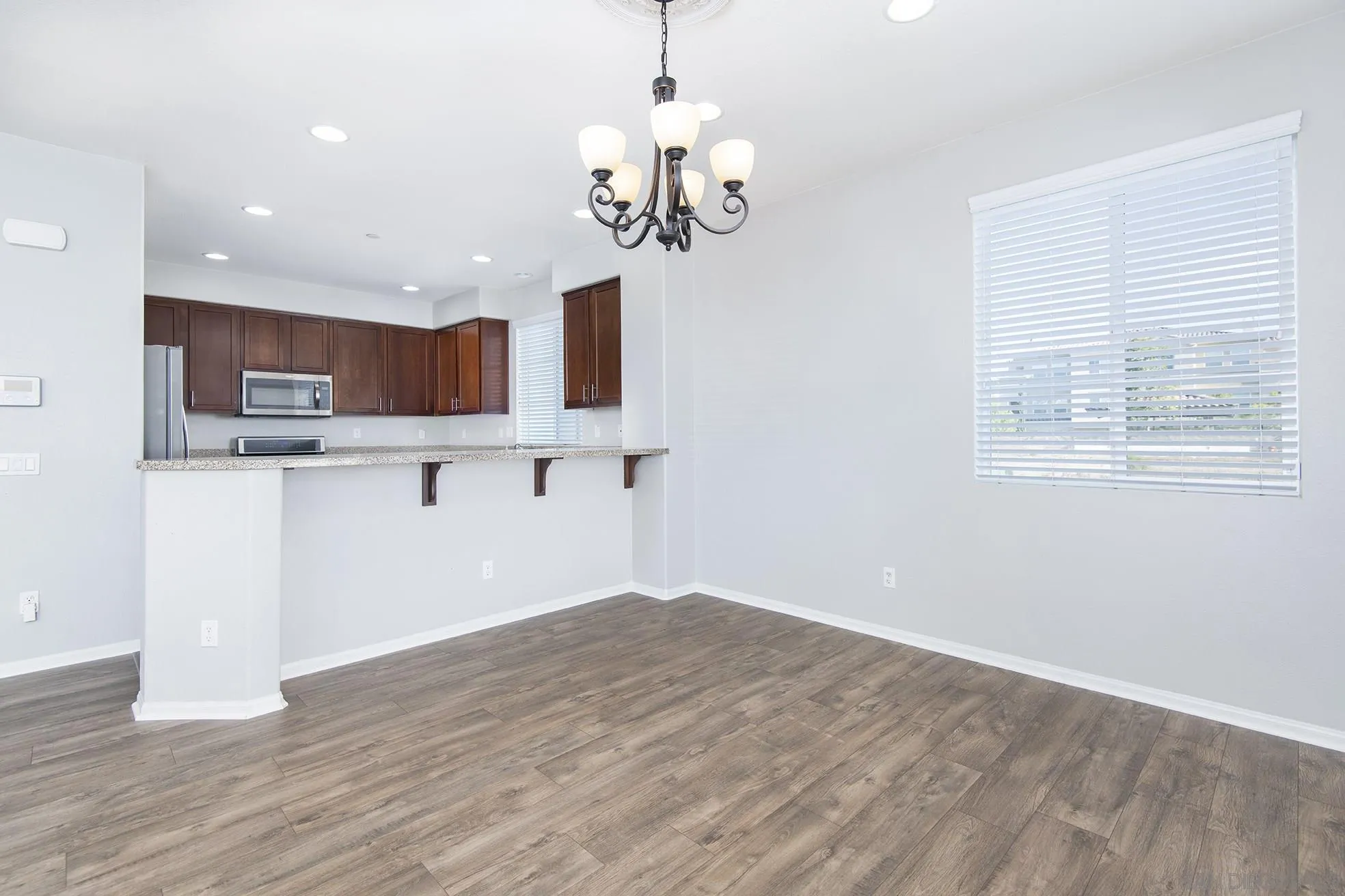 1431 Santa Victoria Road, Unit 5 Chula Vista, CA 91913 - Photo 8 of 26 a view of a kitchen with microwave and cabinets