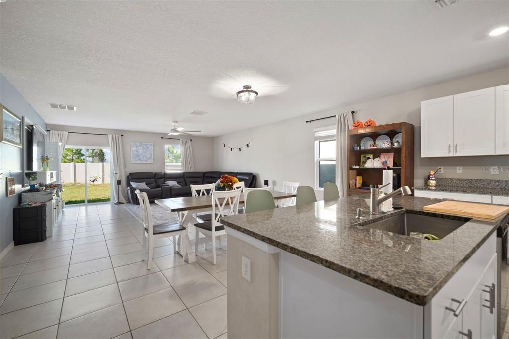 5430 Blue Azure Drive Wimauma, FL 33598 - Photo 11 of 46 a large kitchen with lots of counter space