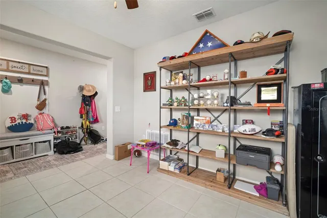 a view of a workspace with furniture