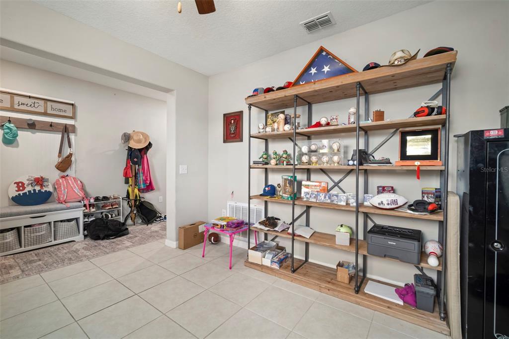 5430 Blue Azure Drive Wimauma, FL 33598 - Photo 22 of 46 a view of a workspace with furniture