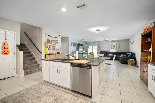 a kitchen with sink and lots of counter top space