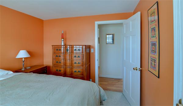 10 Spring Valley Road Natick, MA 01760 - Photo 12 of 17 a bedroom with a bed and a closet