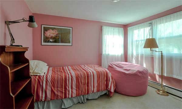 10 Spring Valley Road Natick, MA 01760 - Photo 14 of 17 a bedroom with a bed and a window