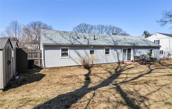 10 Spring Valley Road Natick, MA 01760 - Photo 17 of 17 a view of a house with wooden fence