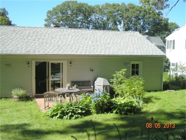 10 Spring Valley Road Natick, MA 01760 - Photo 2 of 17 a front view of house with a garden