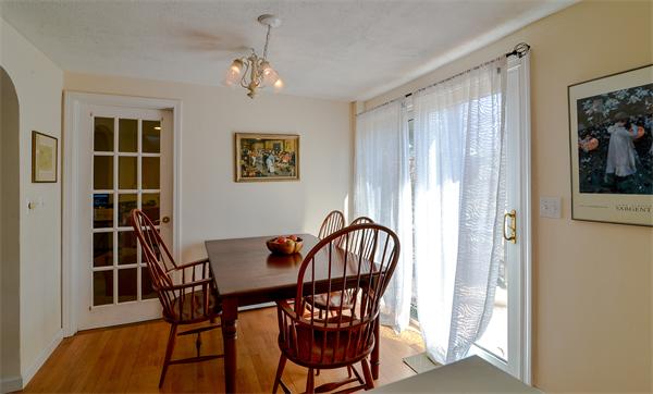 10 Spring Valley Road Natick, MA 01760 - Photo 6 of 17 a view of a dining room with furniture and chandelier