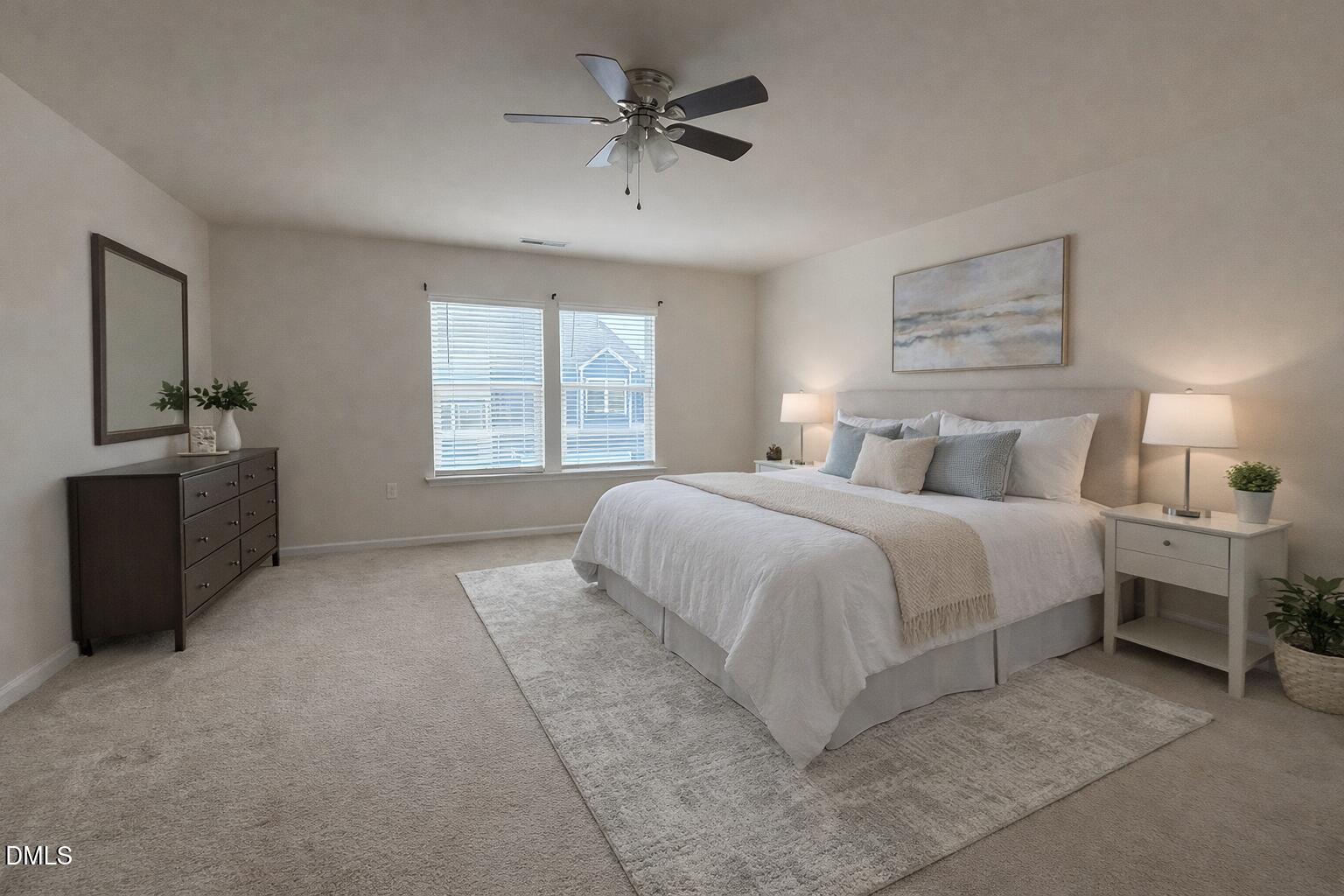 11 Rambler Lane Durham, NC 27703 - Photo 12 of 28 a bedroom with a bed and a chandelier