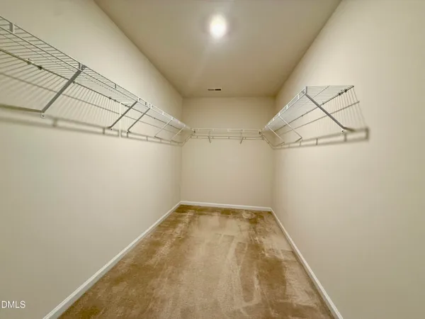 a view of a room with racks on the wall