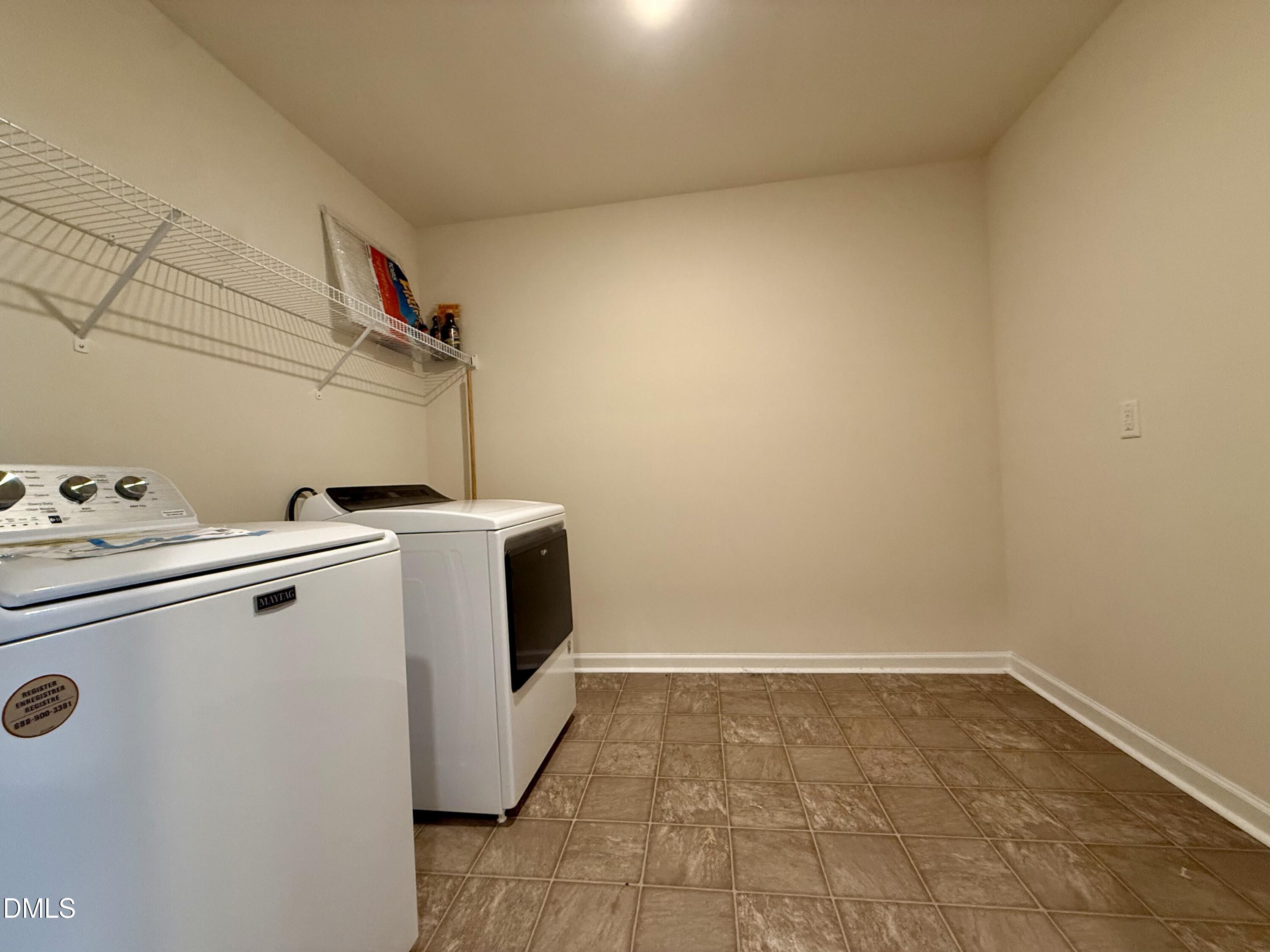 11 Rambler Lane Durham, NC 27703 - Photo 22 of 28 a utility room with dryer and washer