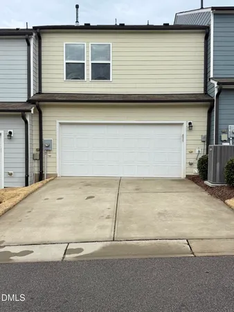 a view of a house with a garage