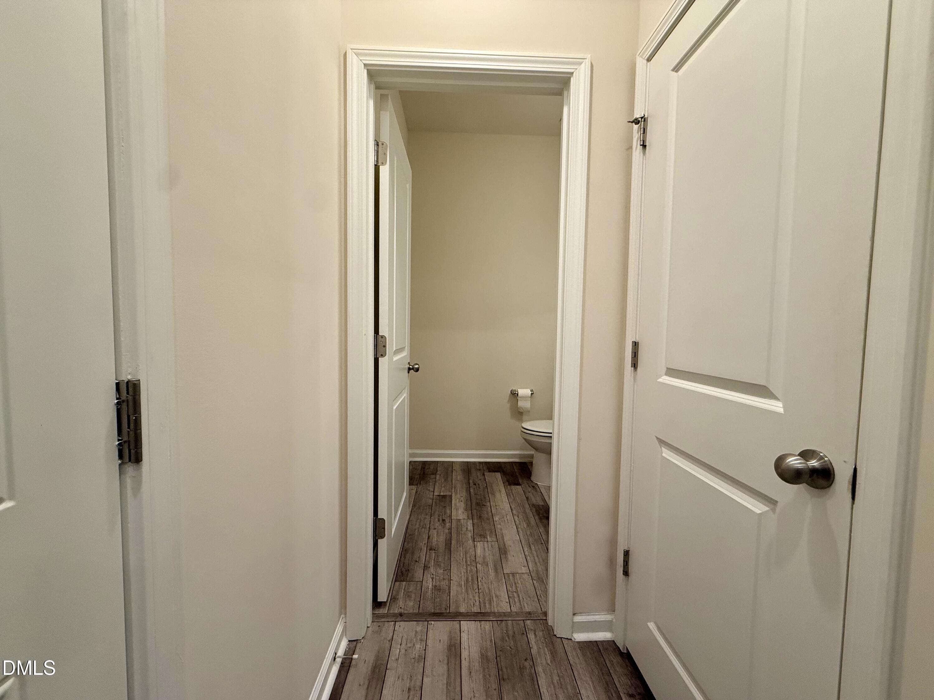 11 Rambler Lane Durham, NC 27703 - Photo 8 of 28 a view of a bathroom from a hallway