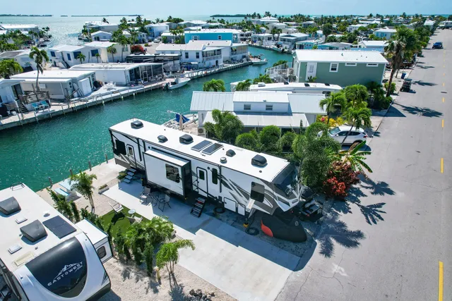 an aerial view of a house with outdoor space