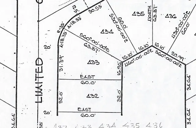 a view of a house with a outdoor space and street view