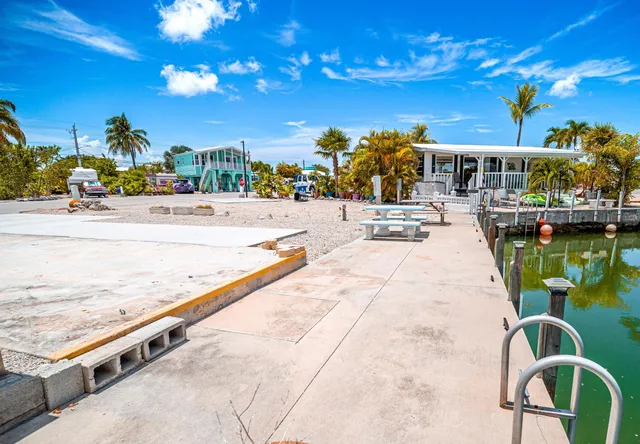 a view of swimming pool with outdoor seating