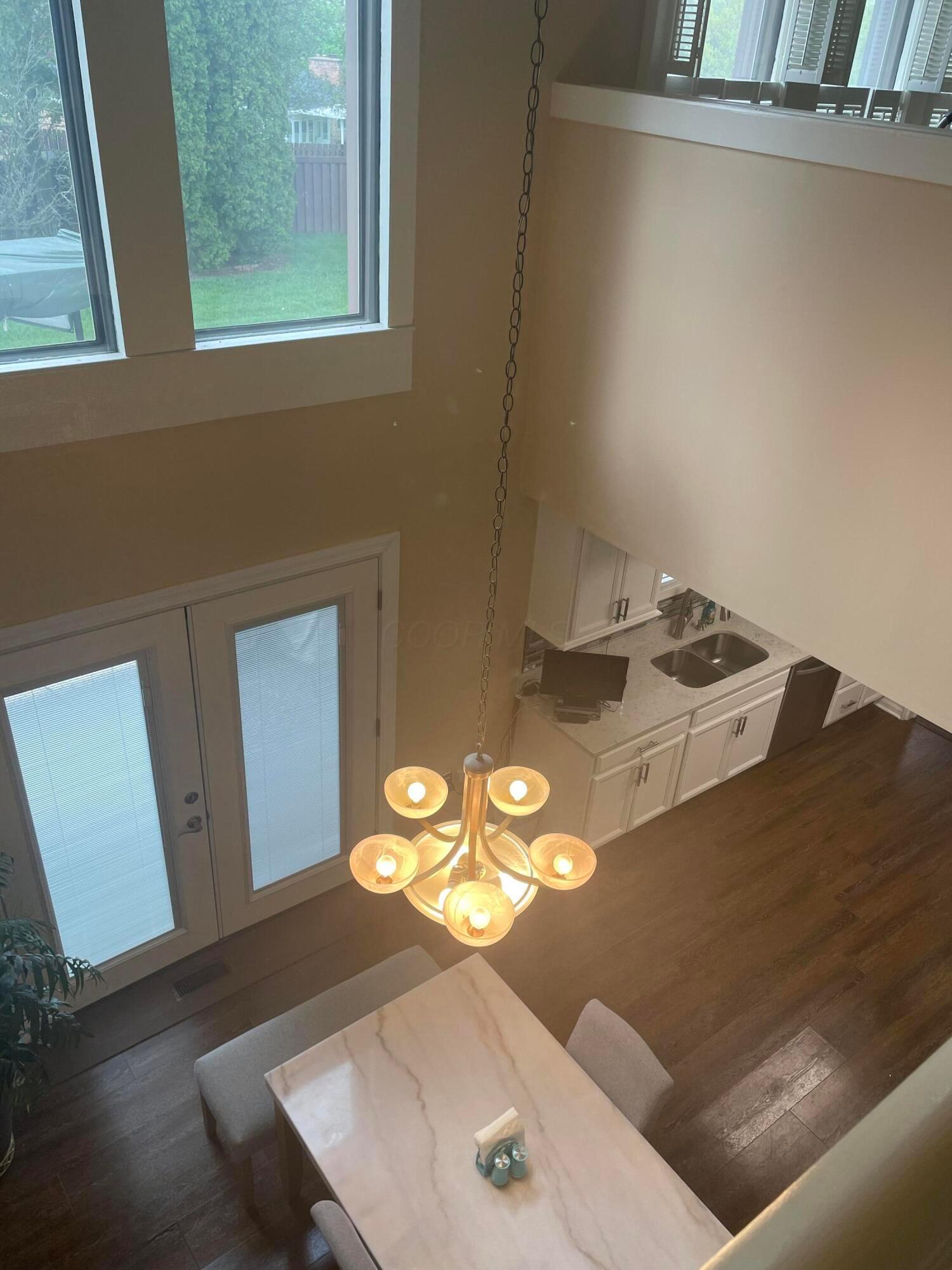 3033 Linmuth Drive West Springfield, OH 45503 - Photo 12 of 22 LOFT VIEW OF KITCHEN DINING AREA