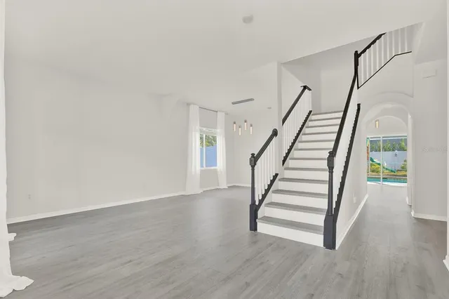 a view of entryway with wooden floor