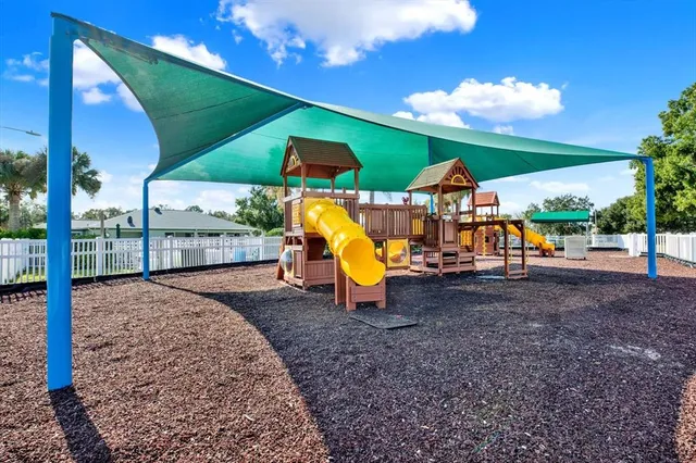 a view of a swimming pool with a terrace