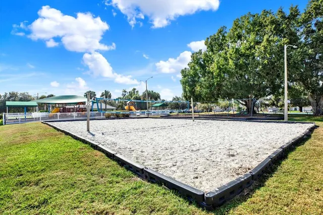 an aerial view of a house with a swimming pool