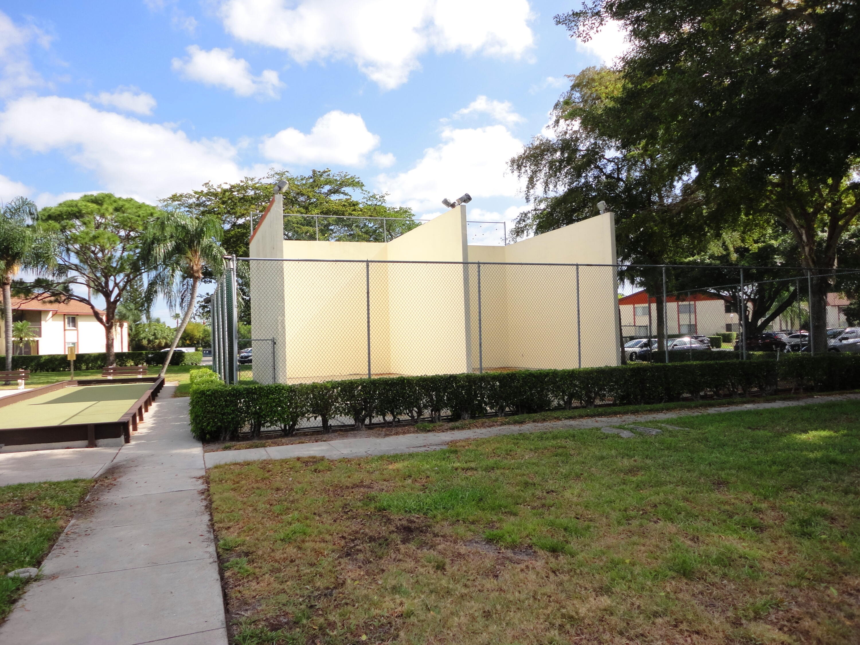 4695 Sable Pine Circle, Unit C2 West Palm Beach, FL 33417 - Photo 11 of 14 a view of a backyard