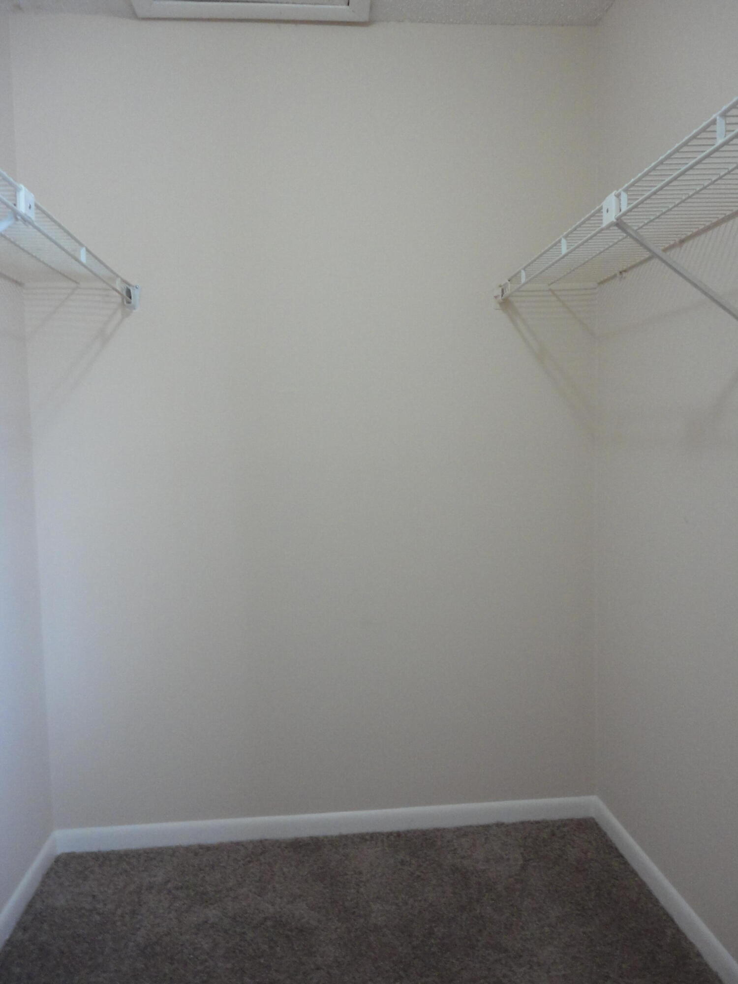 4695 Sable Pine Circle, Unit C2 West Palm Beach, FL 33417 - Photo 6 of 14 a room that has a window in it