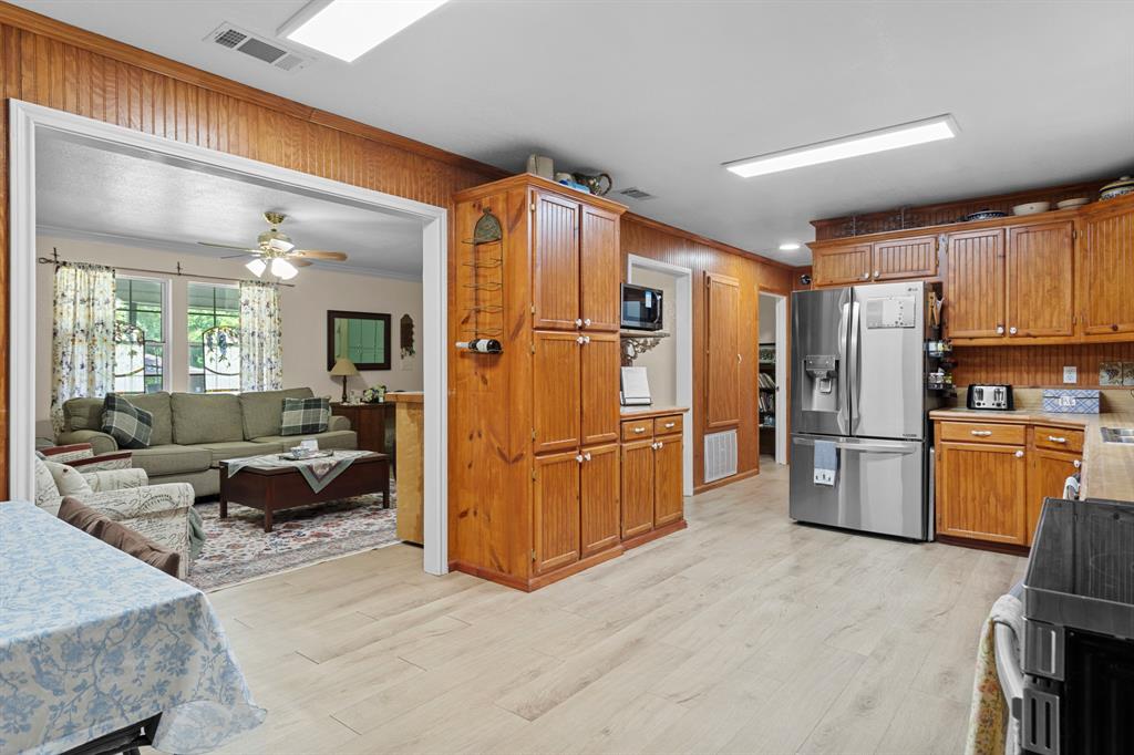 236 Circle Drive Point, TX 75472 - Photo 7 of 25 An open-concept kitchen built to be the natural gathering hub of the home.