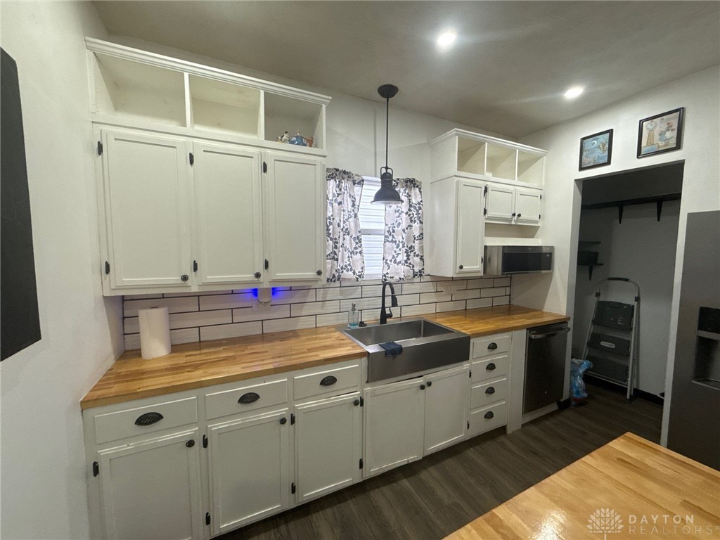 1125 West High Street Springfield, OH 45506 - Photo 4 of 39 This thoughtfully designed kitchen offers both functionality and style.