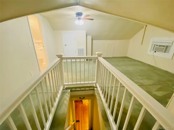 a view of a bathroom with staircase