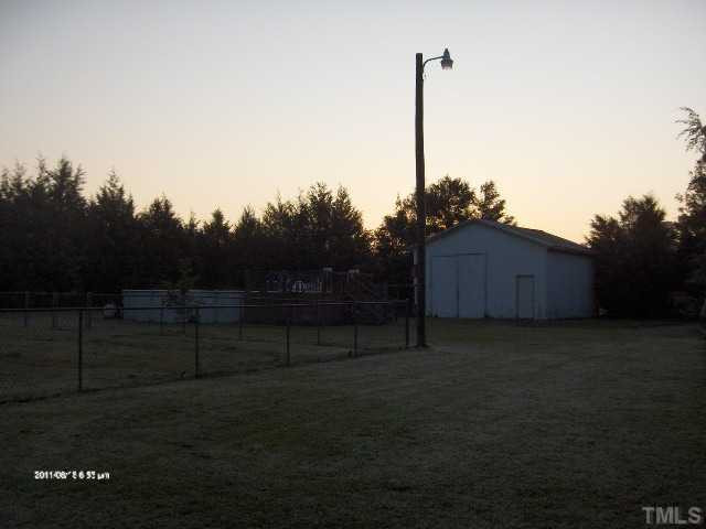 532 Fellowship Church Road Princeton, NC 27569 - Photo 15 of 17 fenced backyard, deck
