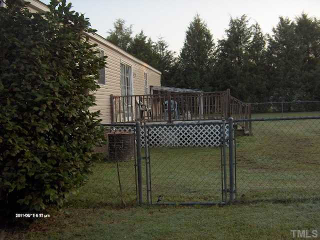 532 Fellowship Church Road Princeton, NC 27569 - Photo 16 of 17 Deck, fenced backyard