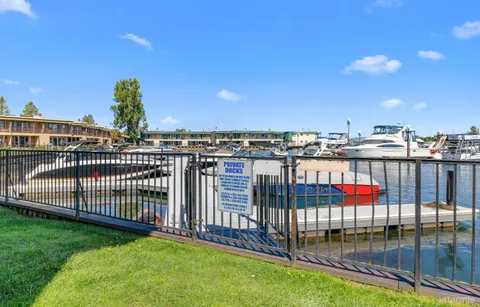 a view of swimming pool from a balcony
