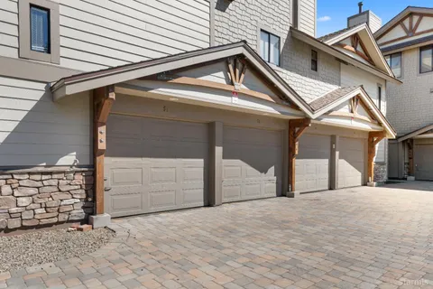 a view of a house with a garage
