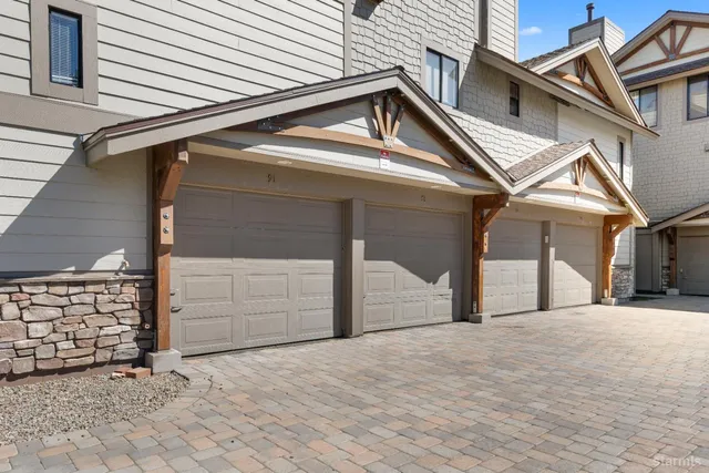 a view of a house with a garage