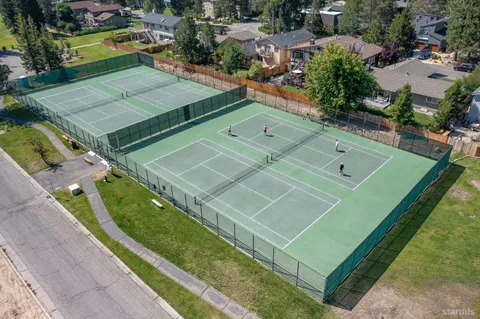 an aerial view of a tennis ground
